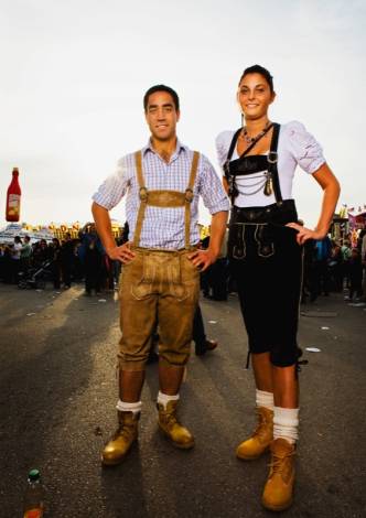 Young blone woman in Bavarian Leather Pants Stock Photo - Alamy
